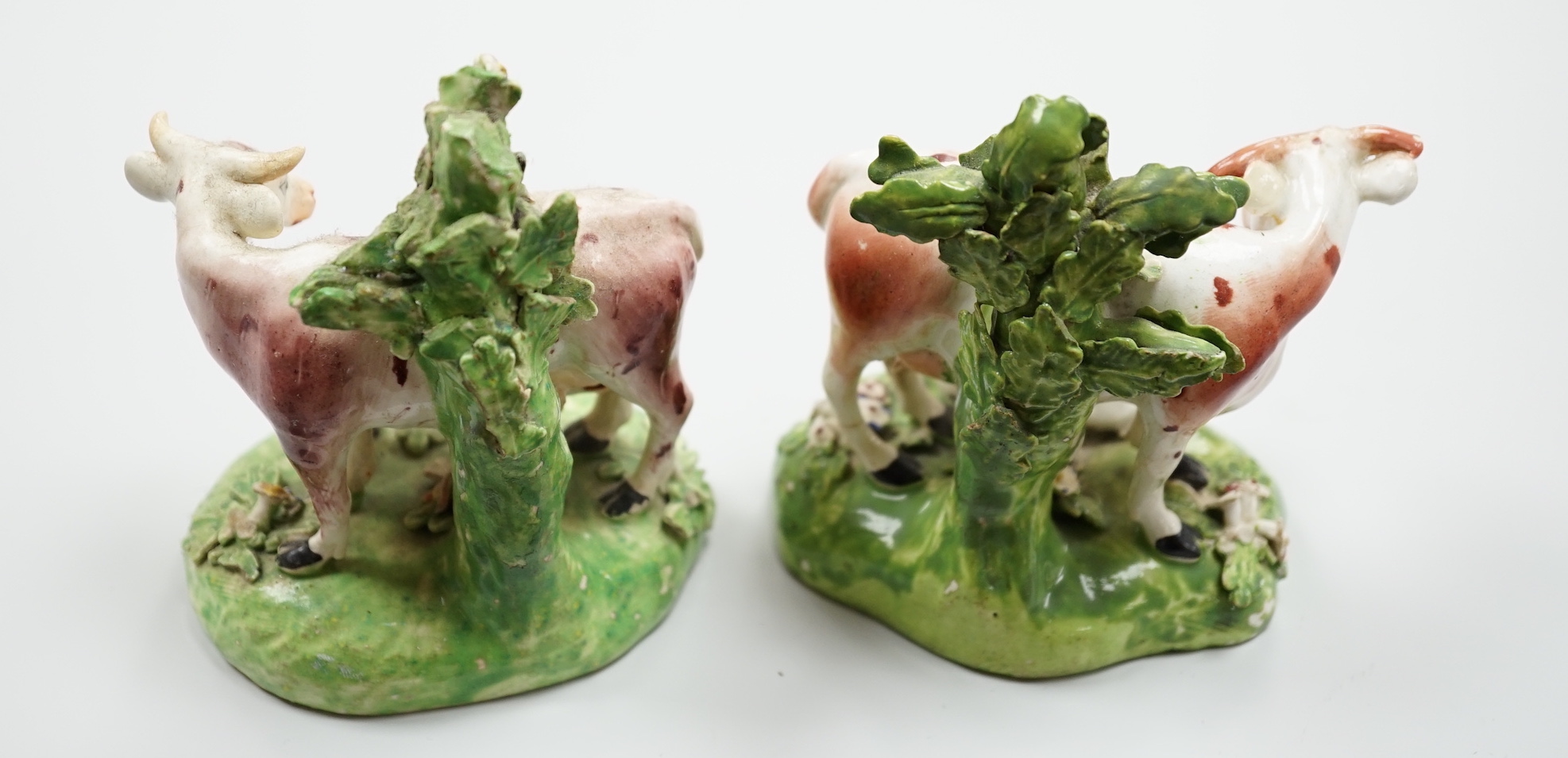 A pair of Derby cow and calf groups, c.1780, 11cm